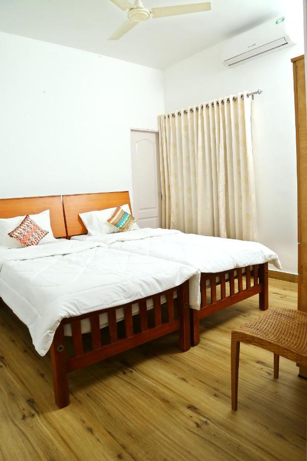 Tess Holistay Fort Kochi ภายนอก รูปภาพ